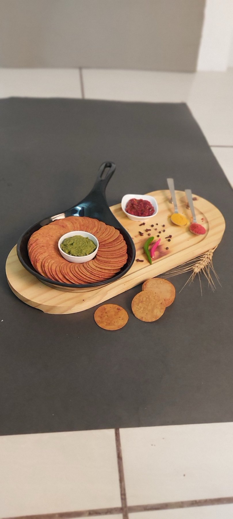 Sena Foods gluten-free crackers arranged with colourful chutneys and spices